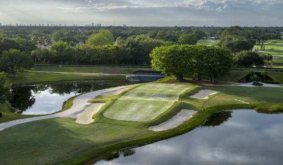 Aerial of the Match golf course next to the water at PGA National Resort