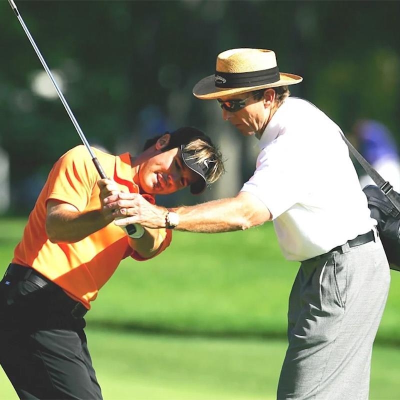 Man getting golf lessons