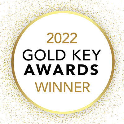 2022 Gold Key Awards Winner in a gold circle with gold flecks