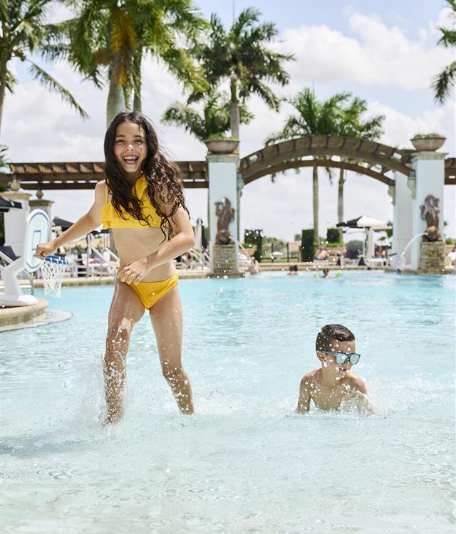 kids playing in the resort pool